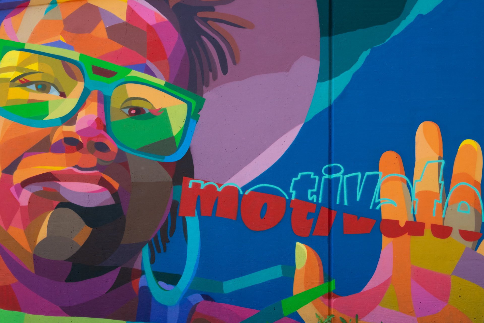  A portion of the mural ‘Hustle &amp; Motivate’ in Lansing, Michigan 