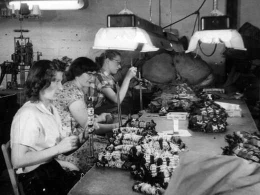 Employees work on the cutting table at Marr Knitting Mill, the predecessor to Fox River Mills in Osage, Iowa. Contributed photo/Courtesy of the Mitchell County Historical Museum