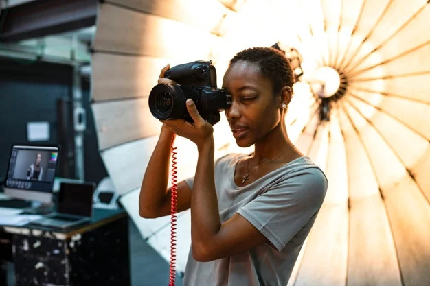 young-photographer-standing-front-reflective-umbrella_53876-82660.jpg