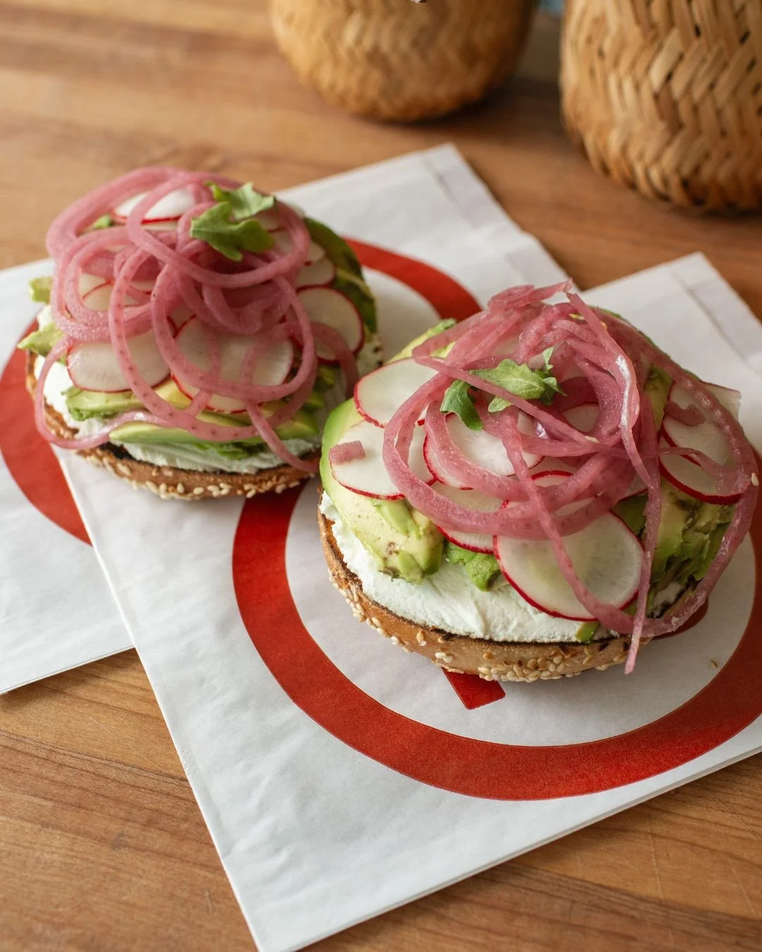 Avocado toast walked so this could run... A Rubinstein bagel with peppered goat cheese, avocado, radish, pickled red onion, and scallions. 💞⁠
⁠
#Seattle #Redmond #Bagels #SLU