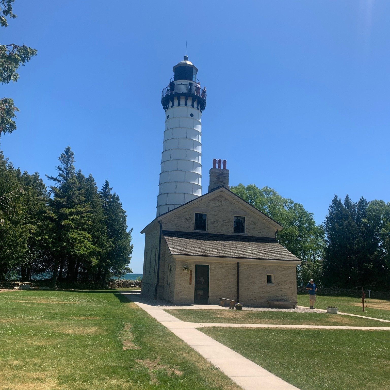 Take in the views and a little history at the Cana Island Lighthouse 🕯️

Just a short drive from Fish Creek, this iconic Door County spot is worth the walk across the causeway (especially at low tide!). Climb to the top for breathtaking Lake Michiga