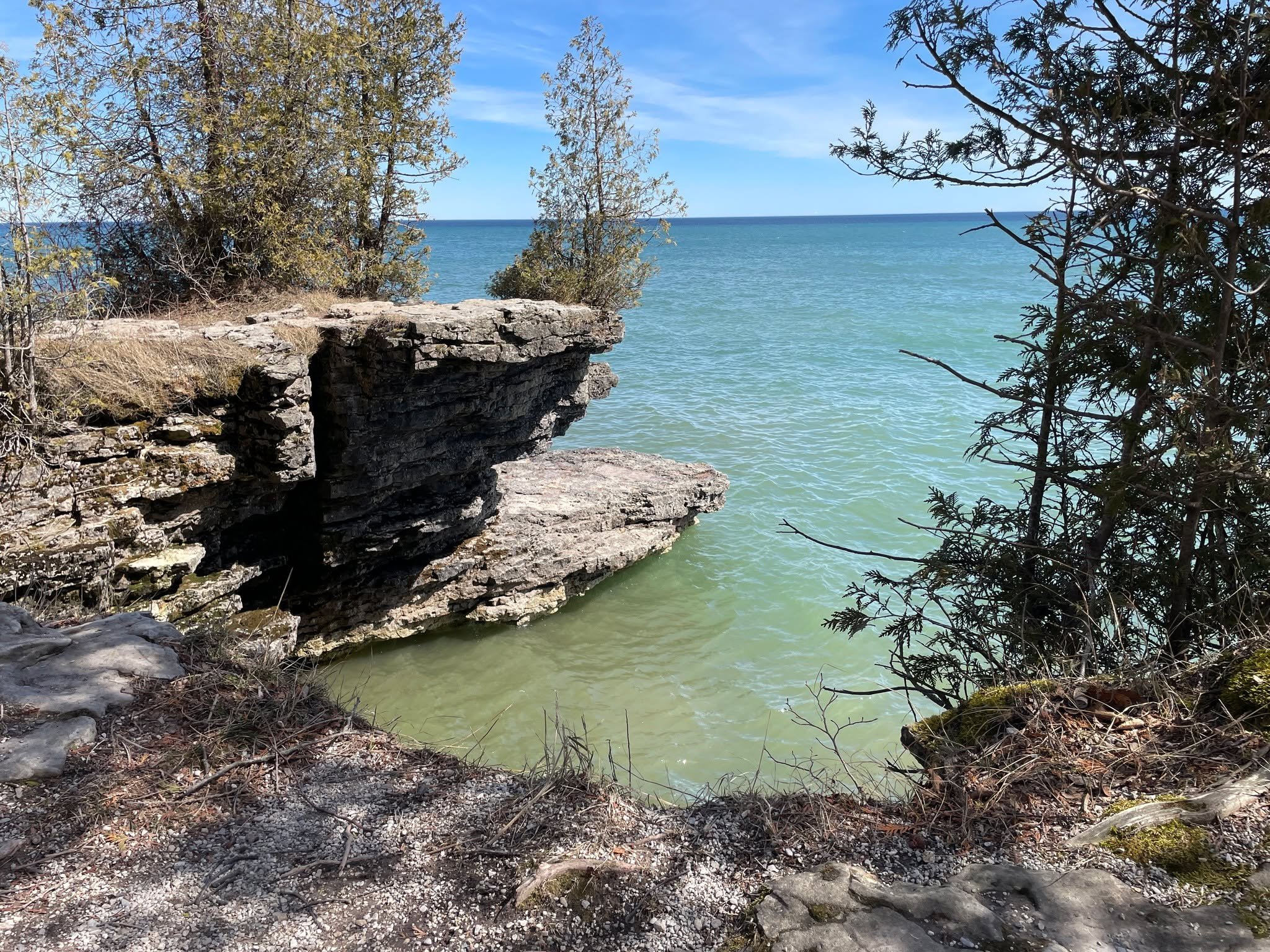 Cave Point in the fall? Absolutely worth bundling up for. 🍁🌊
The crowds thin out, the lake gets moodier, and the views? Amazing!
Bring a thermos, your flannel, and a healthy respect for slippery rocks.

Who else loves a good blustery hike with a si