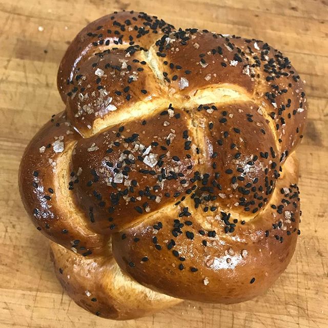 Our braided round #challah is the same weight as our standard six strand braid, just a different shape. As always it's made with #honey from local apiary #shipwreck honey and can be ordered plain or with black sesame and sea salt. Click the link in o