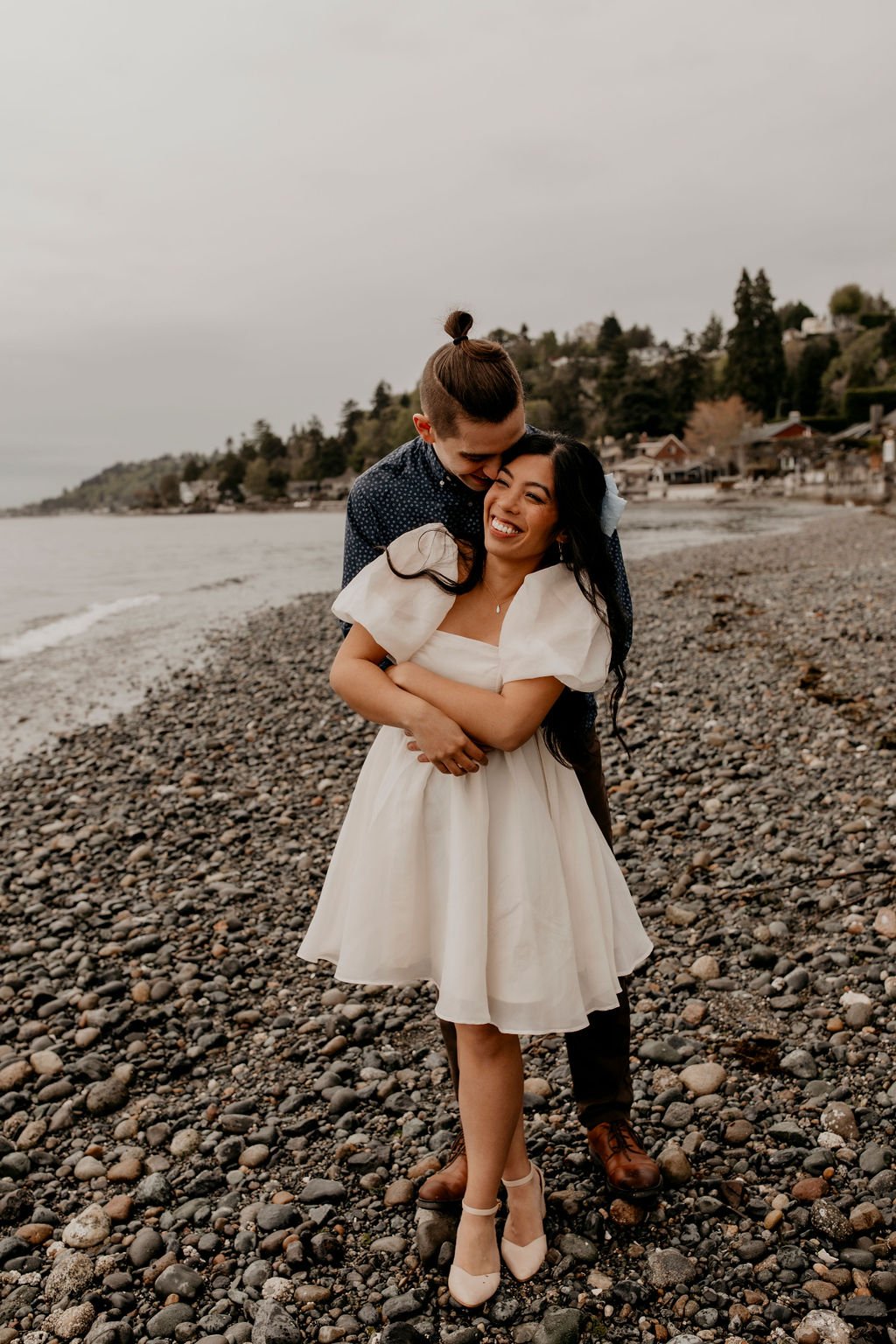 Engagement photoshoot makeup application by Amelia Zaborac at a Western Washington beach