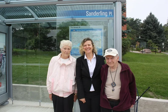 With Sanderling residents Nancy Halford and Ted Chrabaszcz in front of the new bus shelter at 20 Sanderling Place.