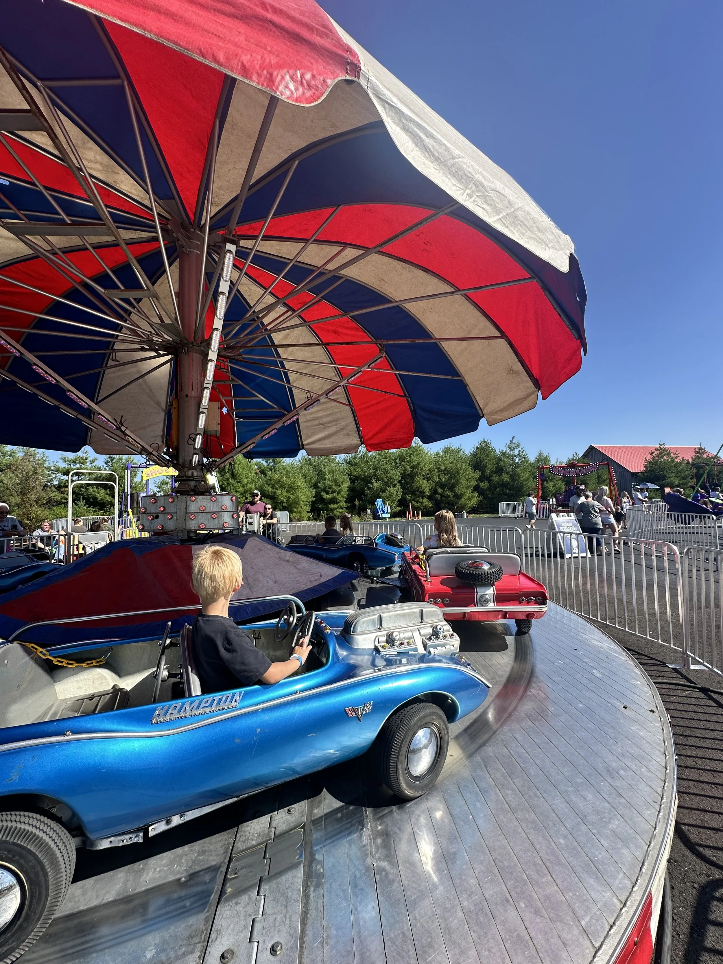 Children's carnival ride at Lark Ranch