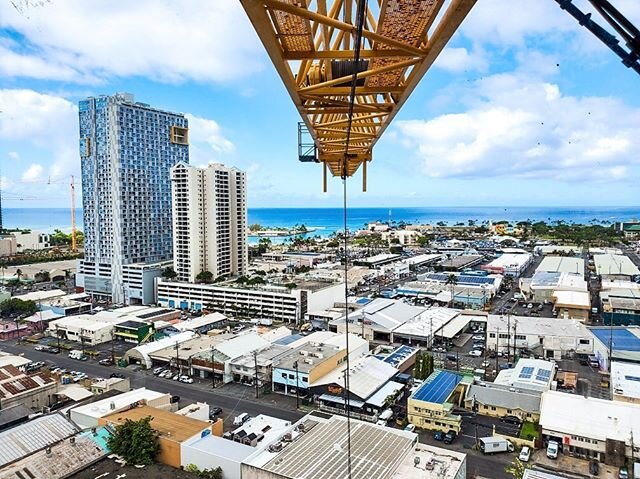 Check out the view from our new Hawaii project, 803 Waimanu for Layton Construction! Garner operator Brynn Maras is the crane operator on site 🏗