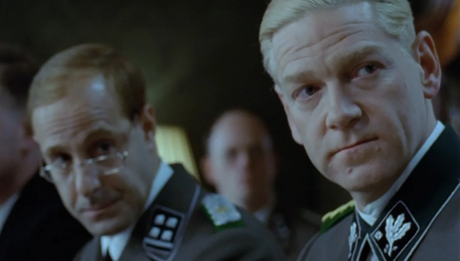 Kenneth Branagh as Reinhard Heydrich and Stanley Tucci as Adolf Eichmann in Conspiracy