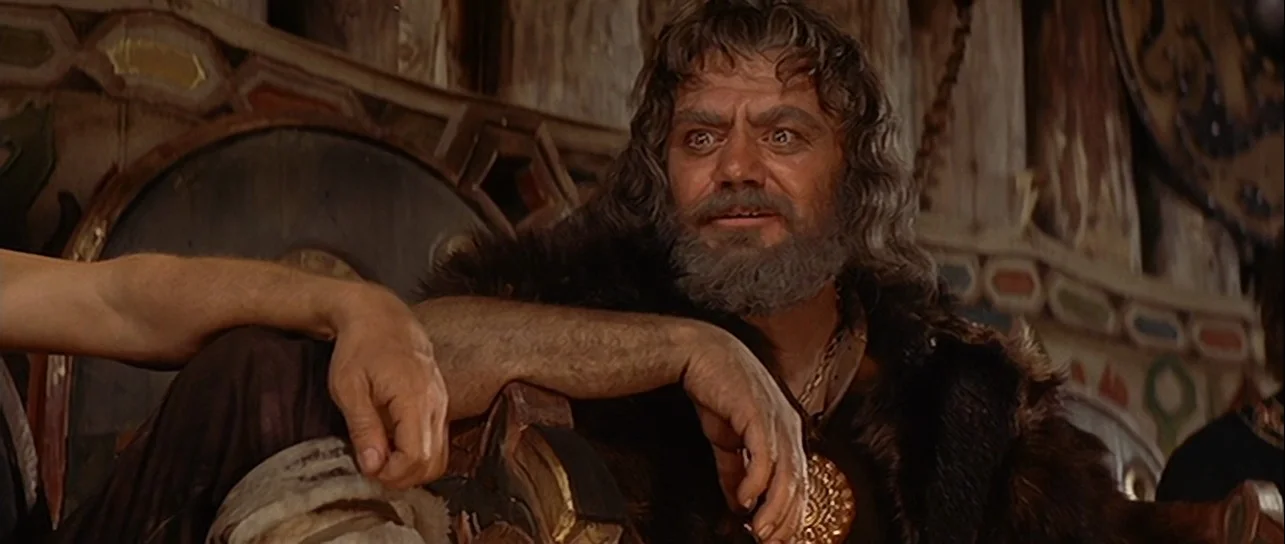 Ernest Borgnine as Ragnar in his hall in The VIkings