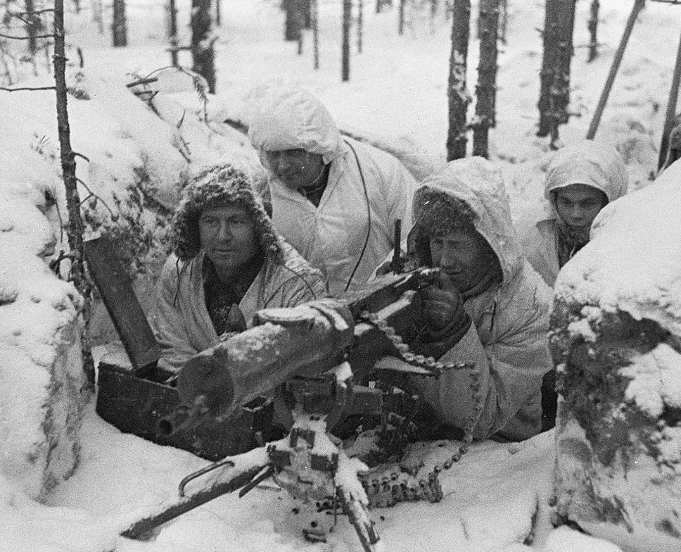A Finnish machine gun crew entrenched in the frozen woods during the Winter War