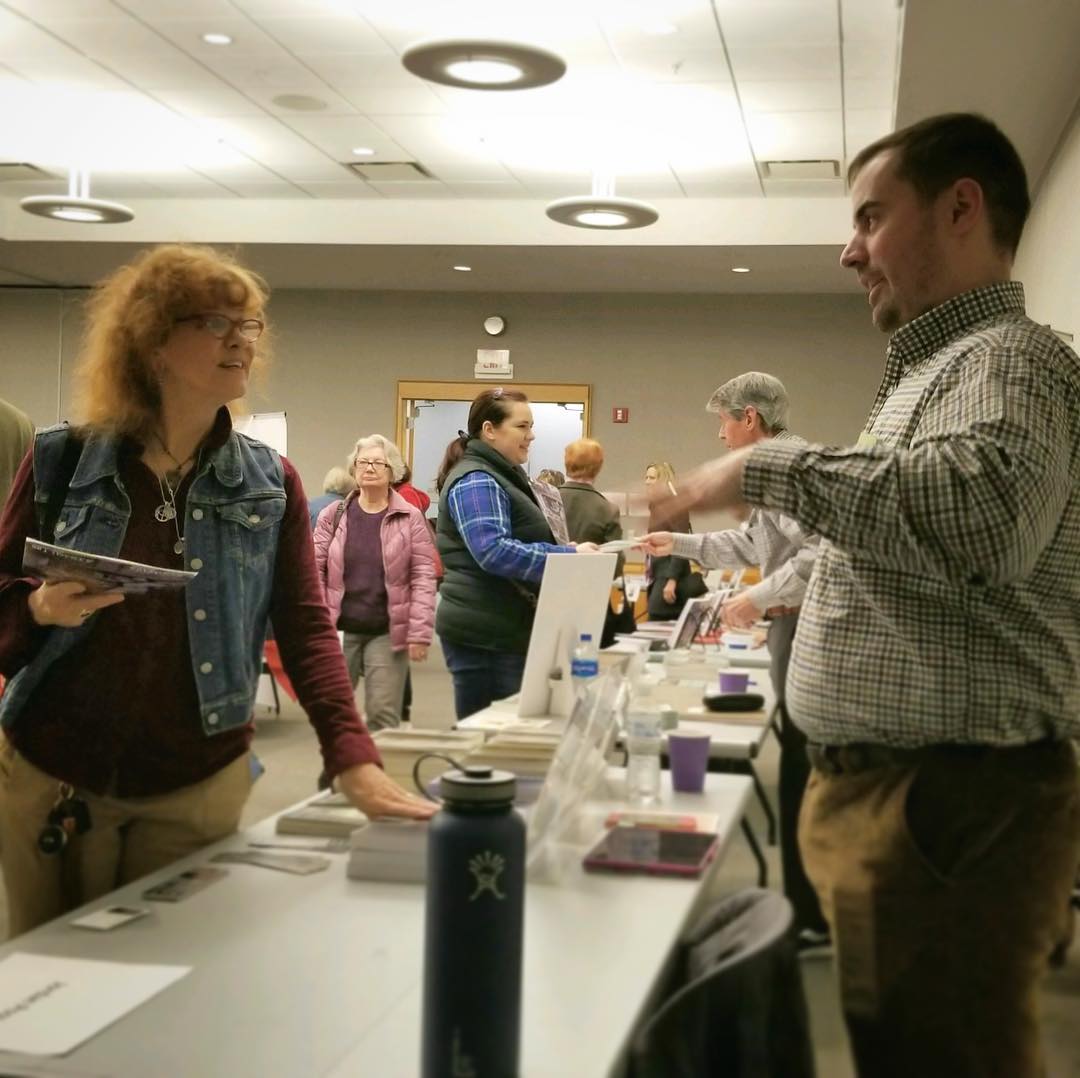 Talking to local readers at my table