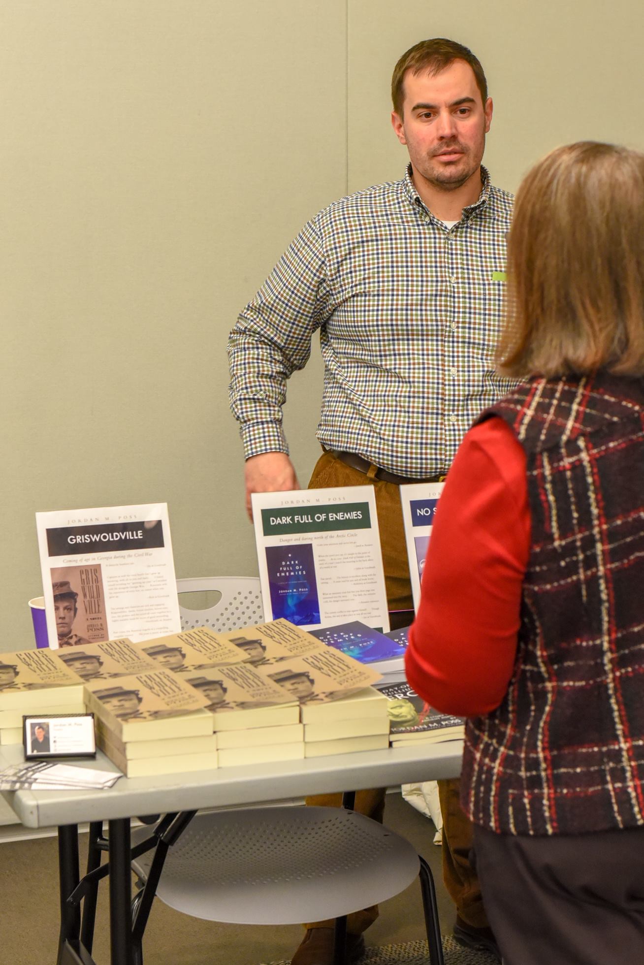 Talking to local readers at my table