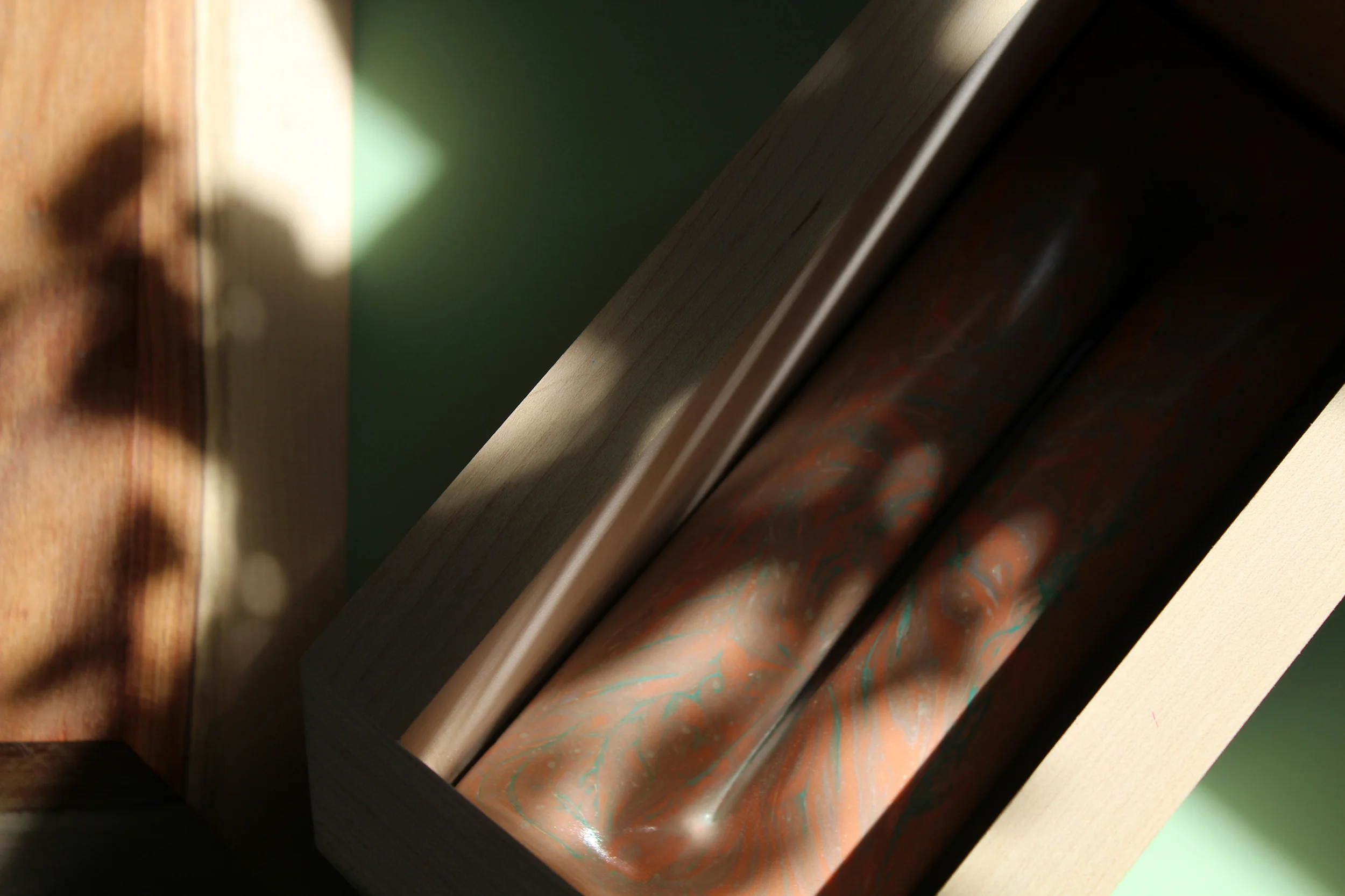 Open jewelry box showing fabric-formed interior