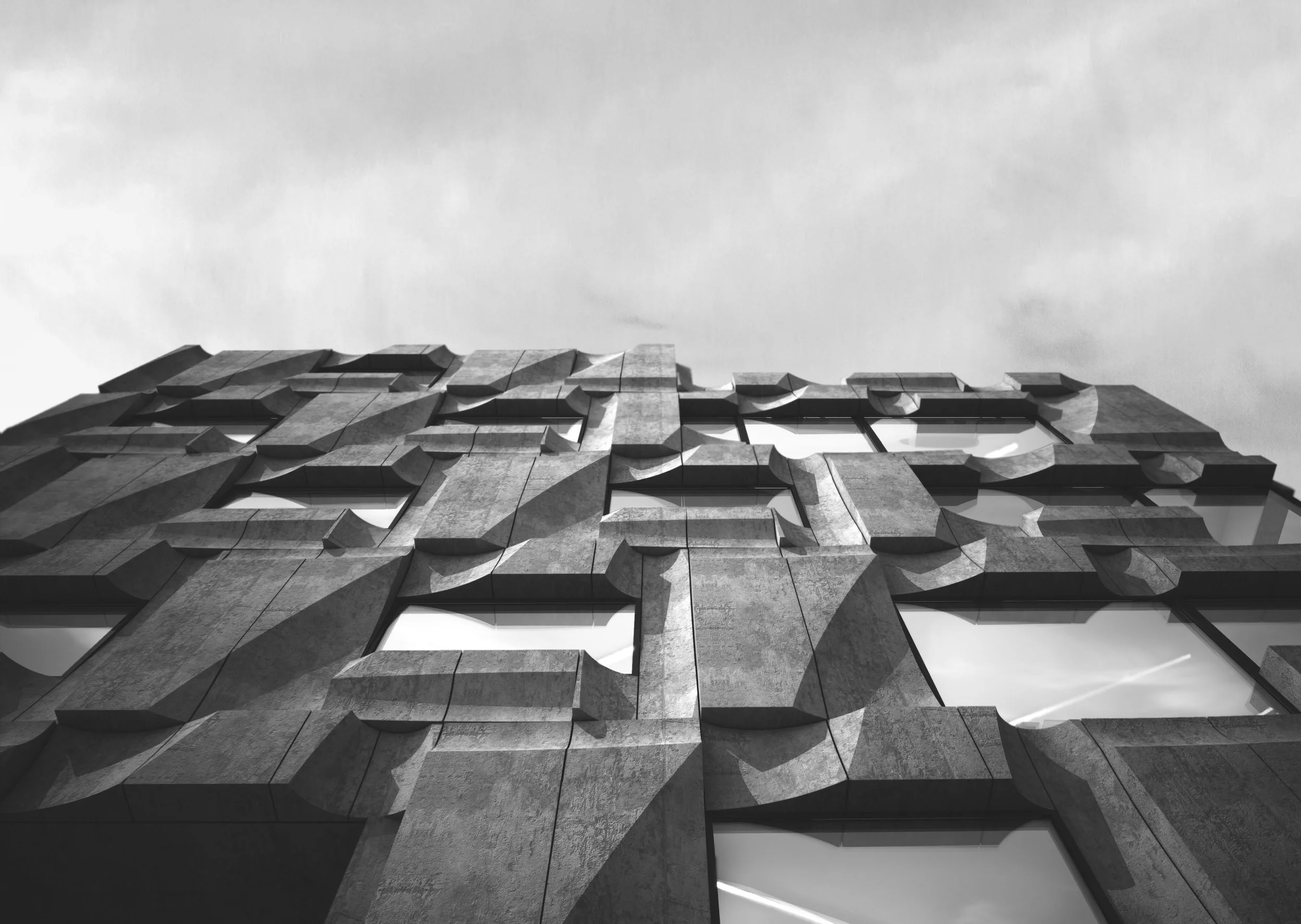 View looking up of front facade with carved concrete panels