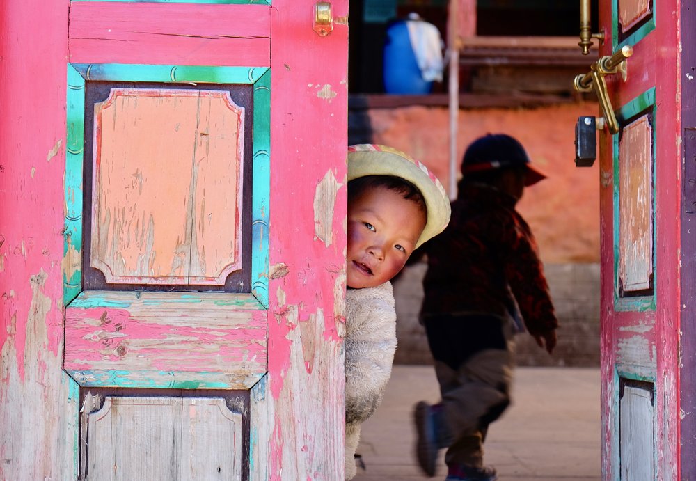 Sherpa children playing during the Nyungne Festival, Pangboche Monastery