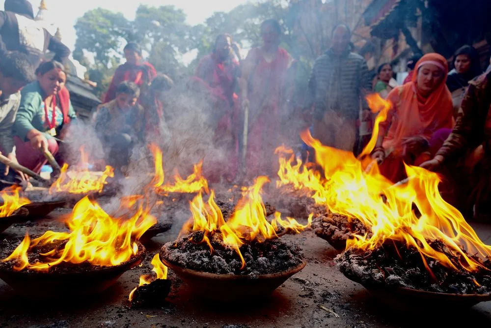 Burning offerings at a Hindu temple