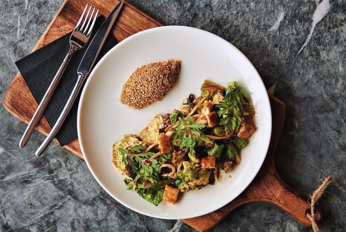 Nappa Cabbage, Sprouts, Roasted Cauliflower, Edamame, Greens, Crisp Tofu, and Miso Honey Vinaigrette served w/ Sweet Potato and Sesame
