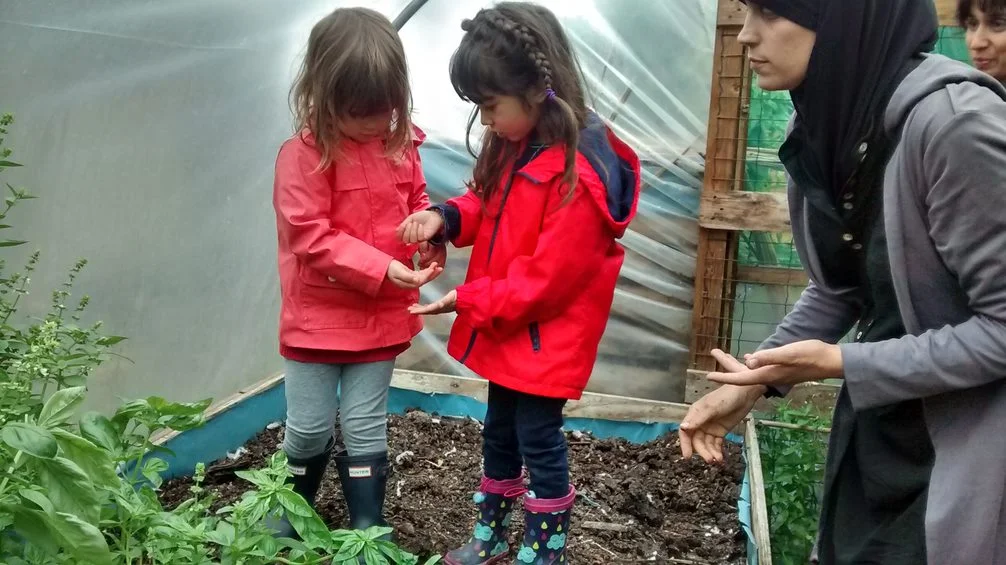 sharing seeds with friends.jpg
