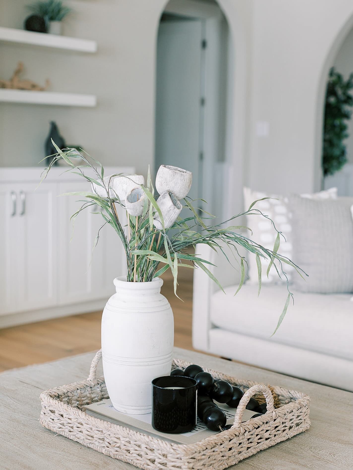 One of our favorite parts of a stage is styling the coffee table! This house on the water in Zionsville is closing soon! @senataylor_realestate_team #crestviewcollection #dvkapppillows #zionsvilleindiana