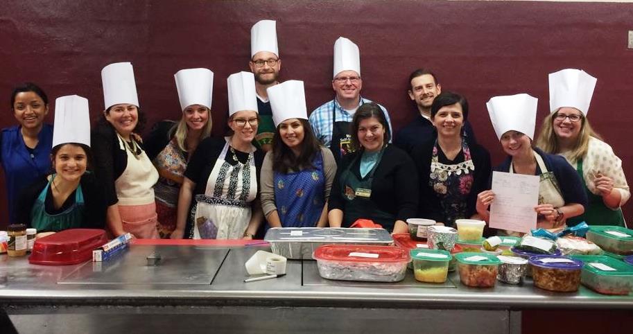 Happy group from Nestle Waters North America making dinner for youth in our Residential program.