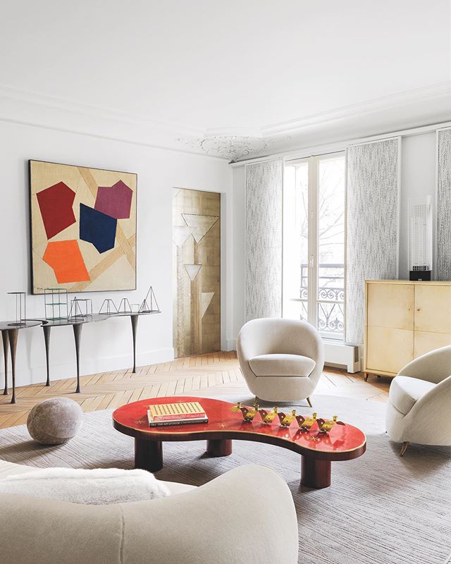 White Out. A gorgeous Paris apartment designed by @galeriehervouet features a Roy&egrave;re sofa and a pair of 1950s Federico Munari armchairs. Photography by @stephanjulliard #research #provenance