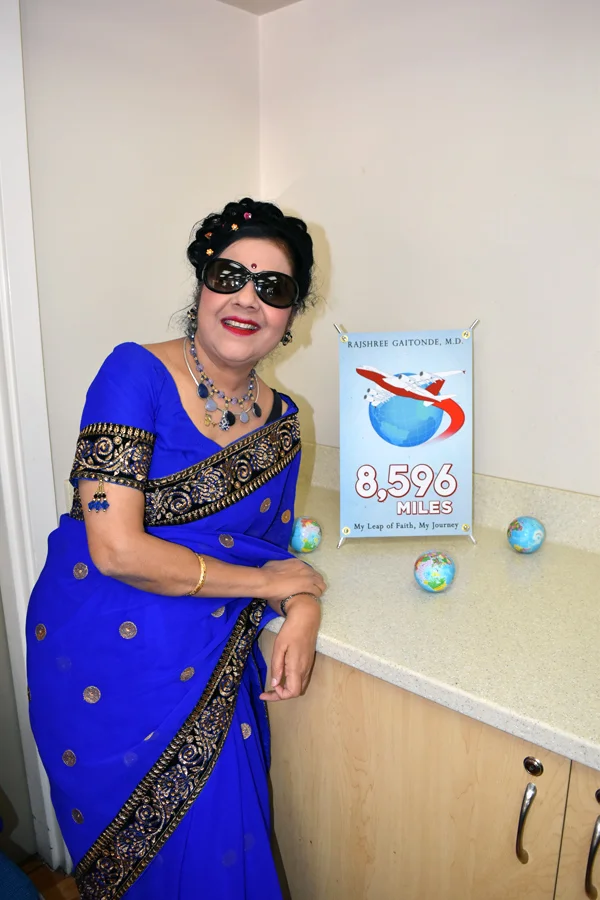 Dr. Rajshree with her book, "8,596 Miles"
