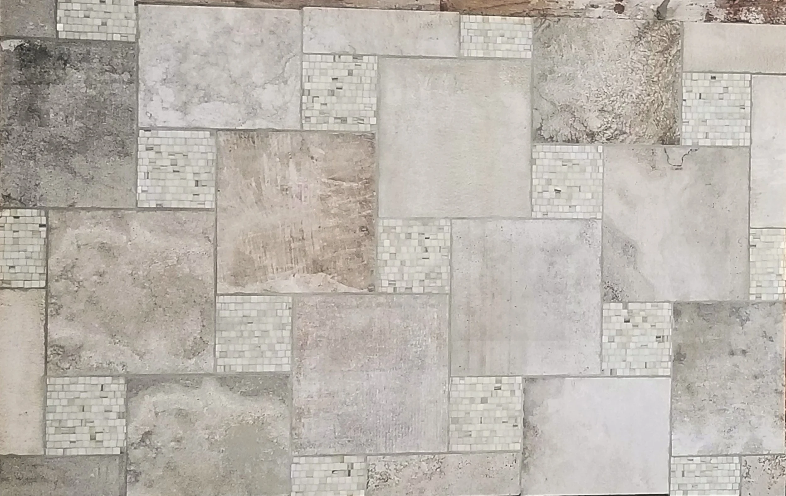 The entry way floor, designed and installed by visiting high school students