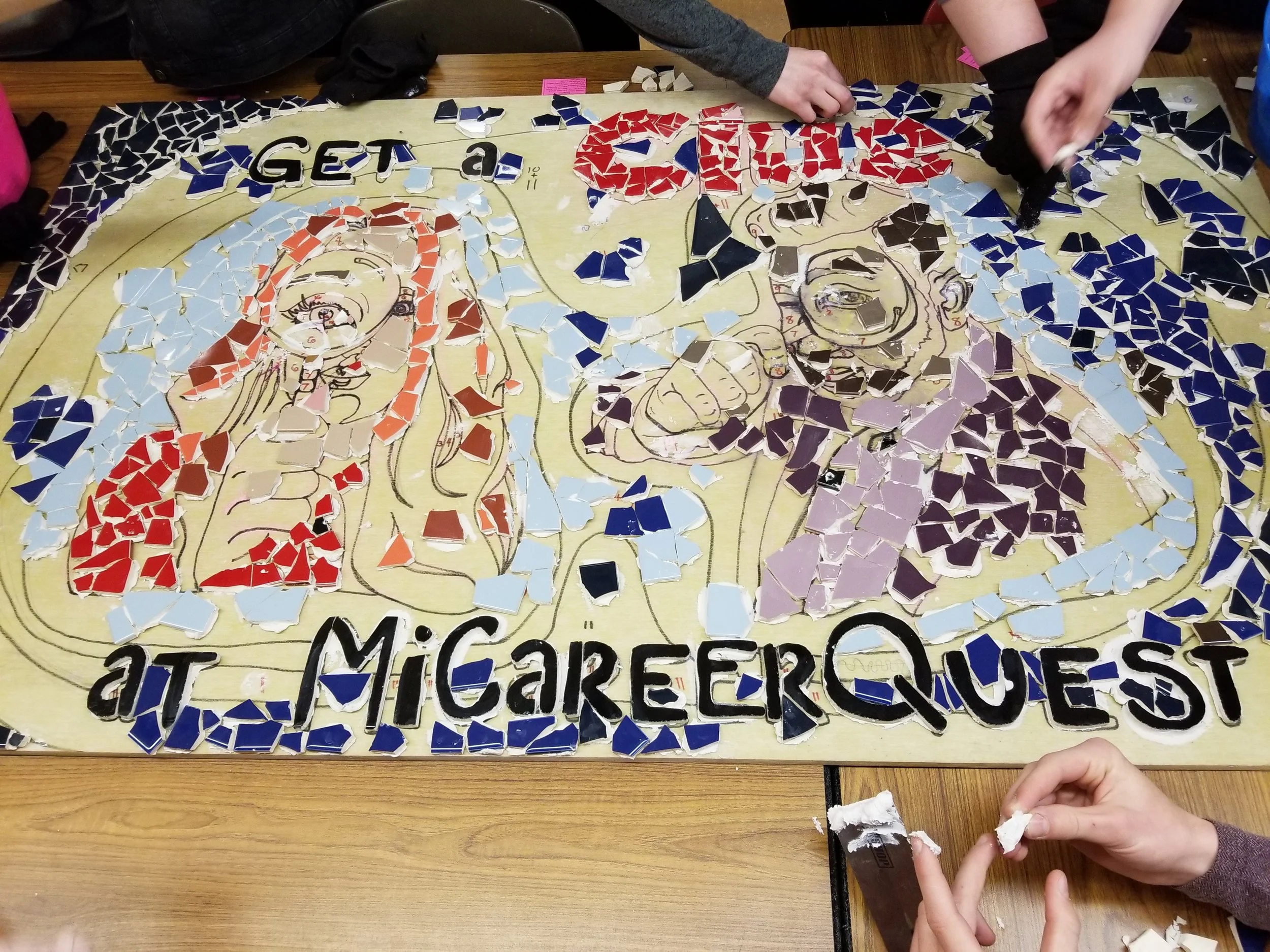 Students of Kent City High School working on the mosaic