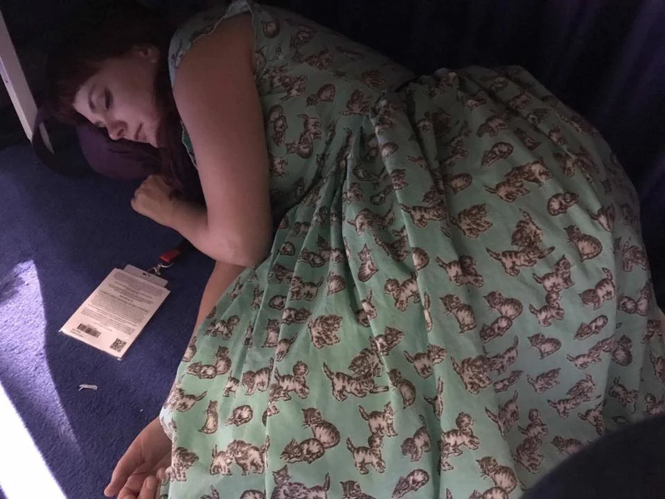 Taking a CAT nap under my table. I was SO wiped!