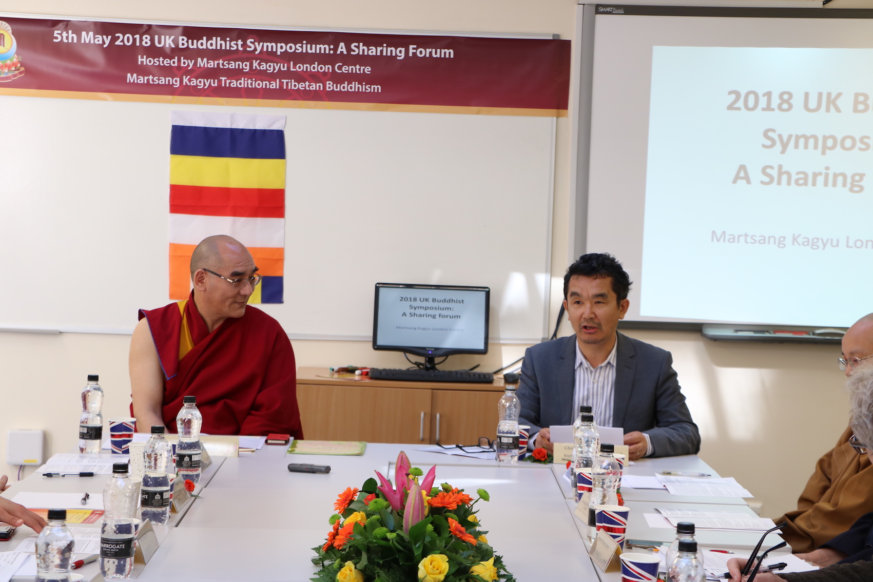 Representative of the Office of the Dalai Lama gives a talk at the beginning of the UK Buddhist Symposium hosted by Martsang Kagyu London Centre