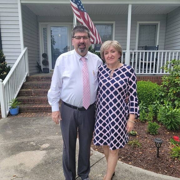 Pastor Carlyle Hall & wife.jpeg