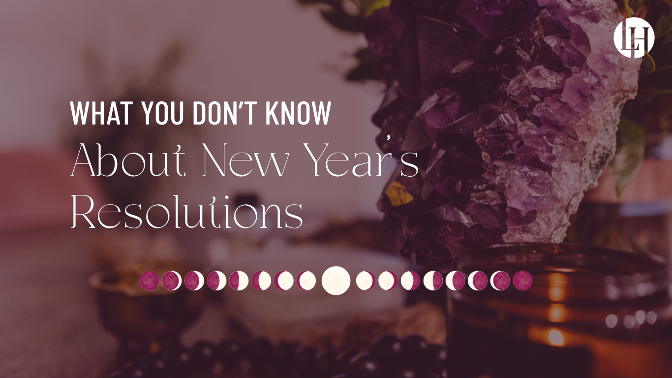 an amethyst crystal next to some alter accessories and a lit candle