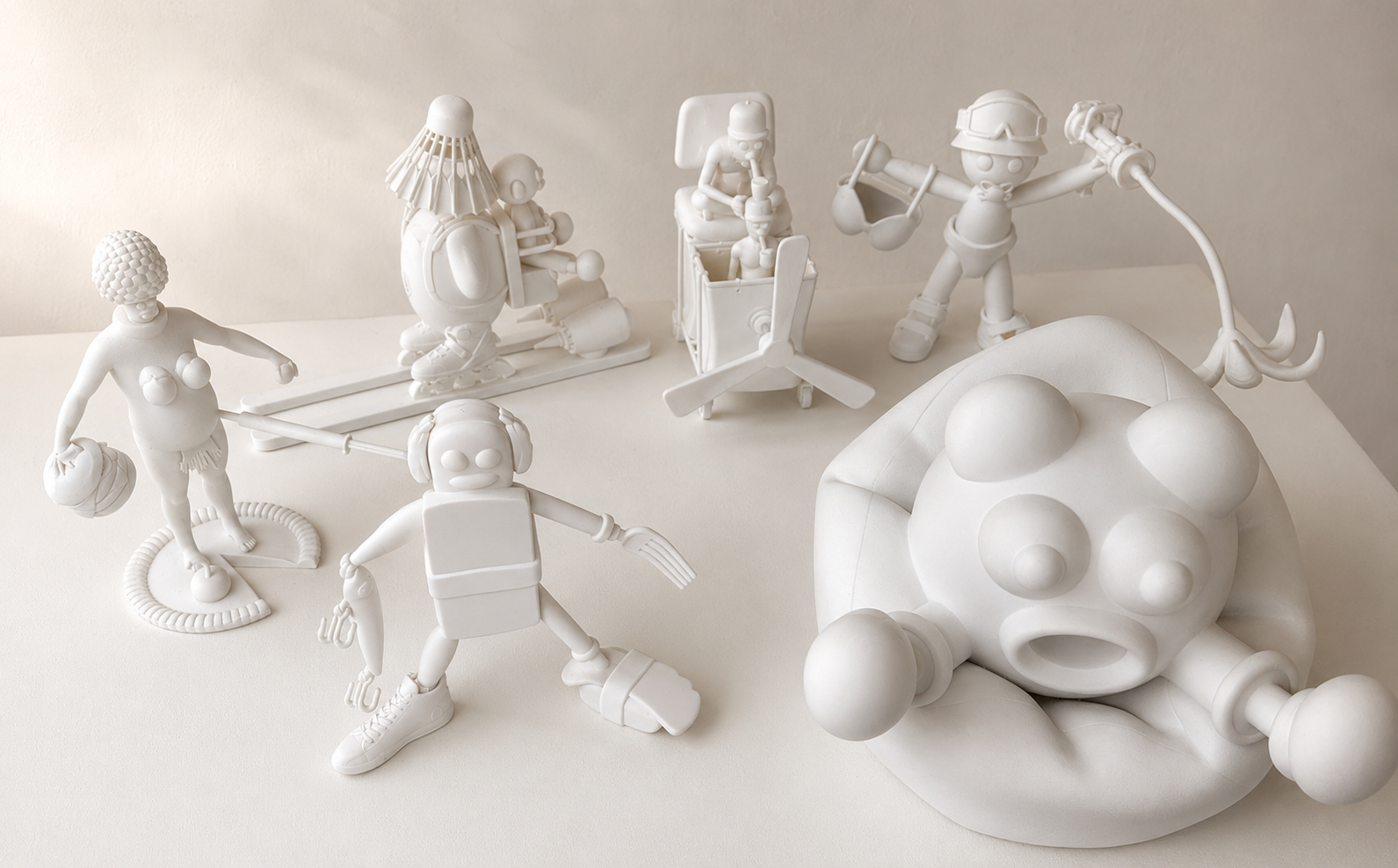 White character sculptures created by Alexander Reagan