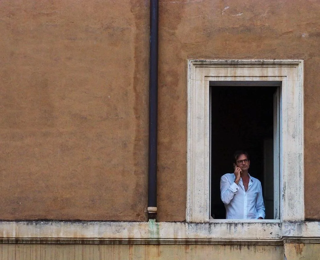 street_maninwindow_italy.jpg