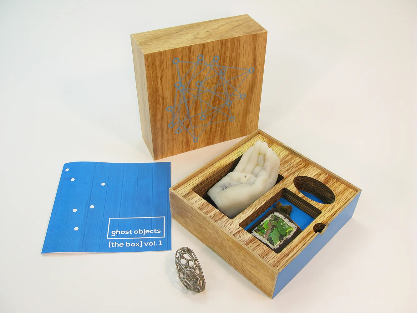 Comma’s debut edition, Ghost Objects, contains objects by Kevin Curry, Lilian Garcia-Roig, Carolyn Henne. The box is made from reclaimed wood with screen-printed and painted surfaces, designed by Judy Rushin.