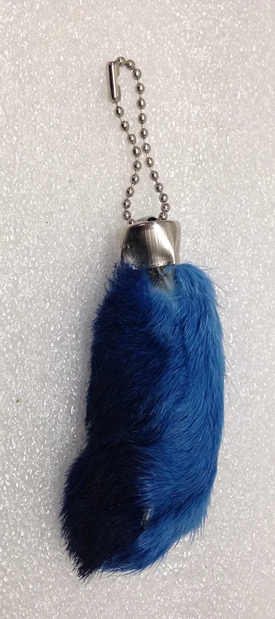 Record Number: 013 Collection Date: 25 Sept 2017 Description: Blue rabbit's foot talisman Dimension: 3.25" x 2.5" x 1"