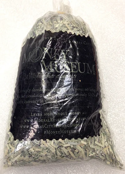 Record Number: 024 Collection Date: 21 Oct 2017 Description: Shredded US currency, bag Dimension: 6" x 3" x 2"