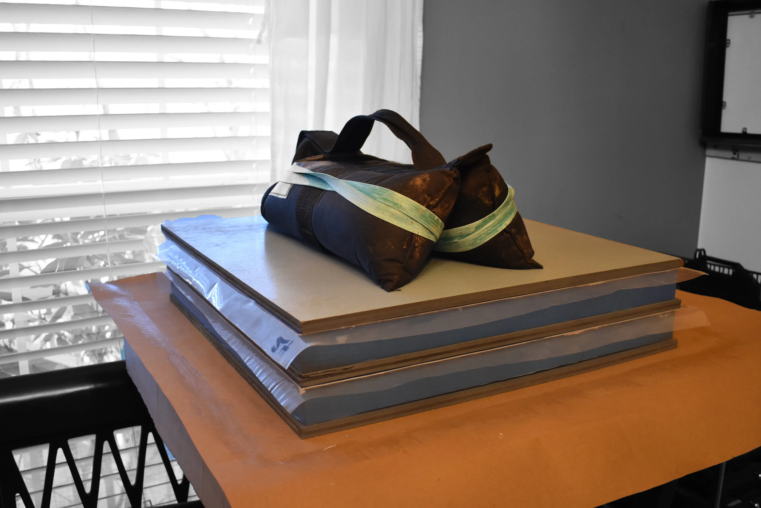 …. and is covered with a board and weighted for at least 24 hours