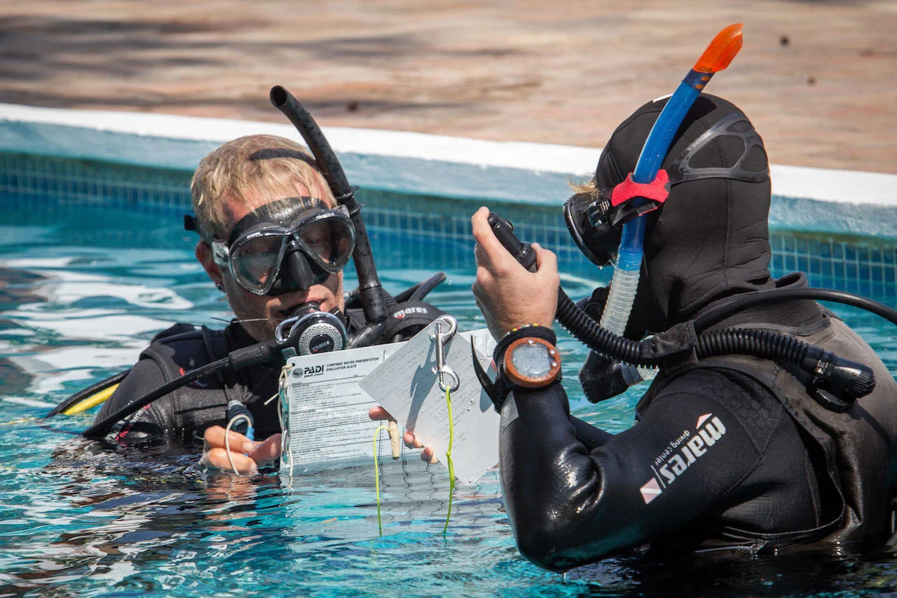 jari in pool with student.jpg