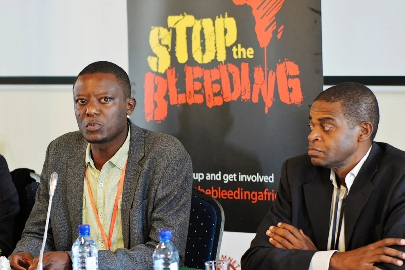Tax Justice Network Africa (TJNA) Executive Director Alvin Mosioma and a colleague during a past event. PHOTO/COURTESY