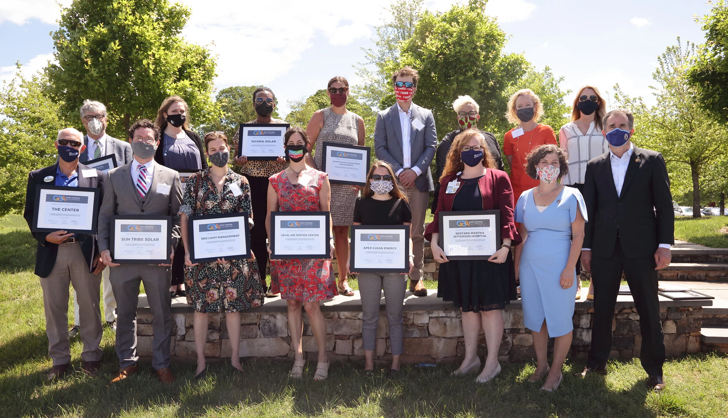 Front Row L to R: Peter Thompson, Senior Center; Devin Welch, Sun Tribe Solar; Ann Kingston, Red Light Management; Angela Ciolfi, Legal Aid Justice Center; Madeleine Ray, Apex Clean Energy; Catherine Hughes, Sentara Martha Jefferson Hospital; Susan Kruse, C3; and Governor Ralph Northam. Back Row L to R: Martin Chapman, Indoor Biotechnologies; Jennifer Lehman, Hantzmon Wiebel; Sarah Nerette, Sigora Solar; Kelly Carwile, QIM; Gordon Sutton, Tiger Fuel; Kelli Palmer, CFA Institute; Liza Borches, CMA Colonial Nissan and CMA Volvo Cars of Charlottesville; Kristy Phillips, Willowtree. Photo Credit: Tom Cogill