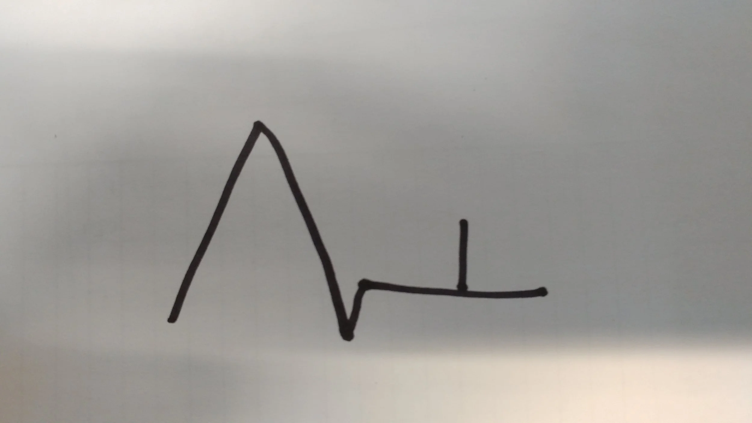 In this symbol, the tree is on flat land or near a valley. 