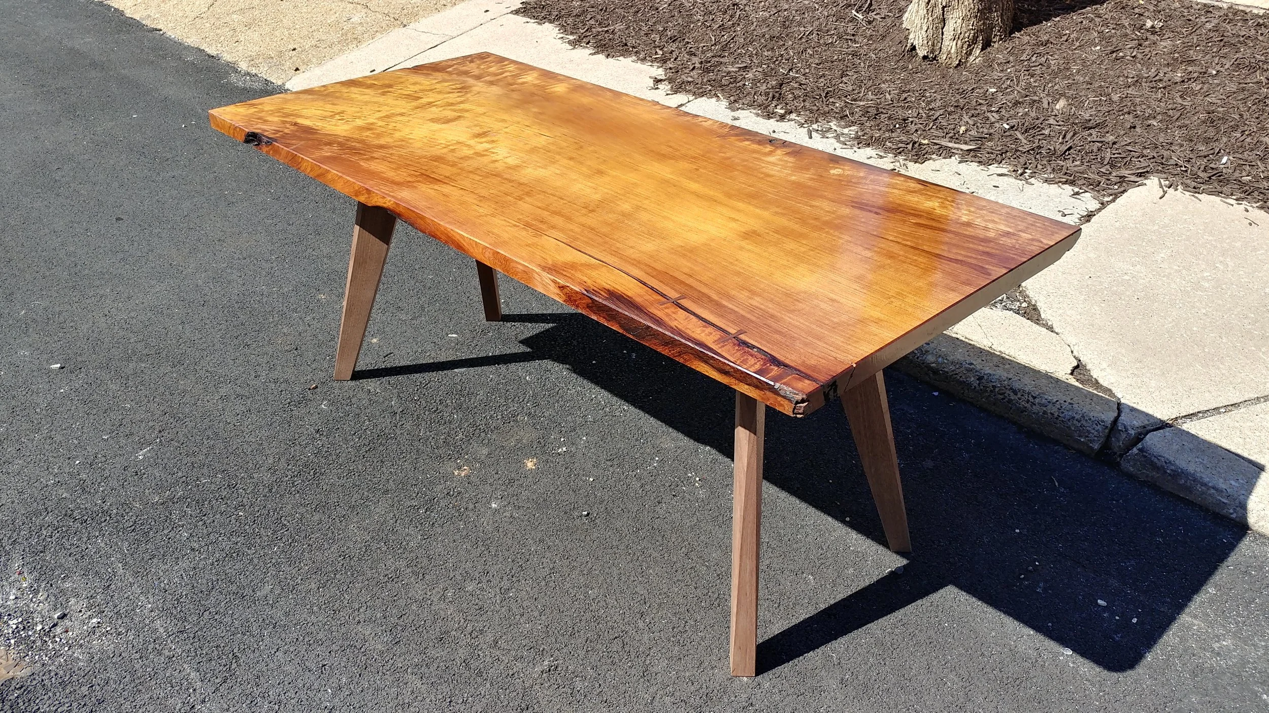 The sister table is mostly a rectangle.