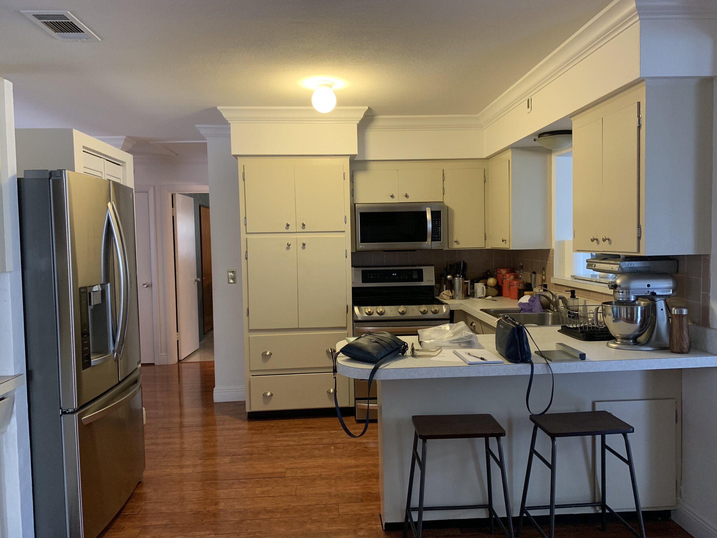 The “Original” kitchen of the house. Inadequate pantry, lack of proper drawers, and bad appliance placement.