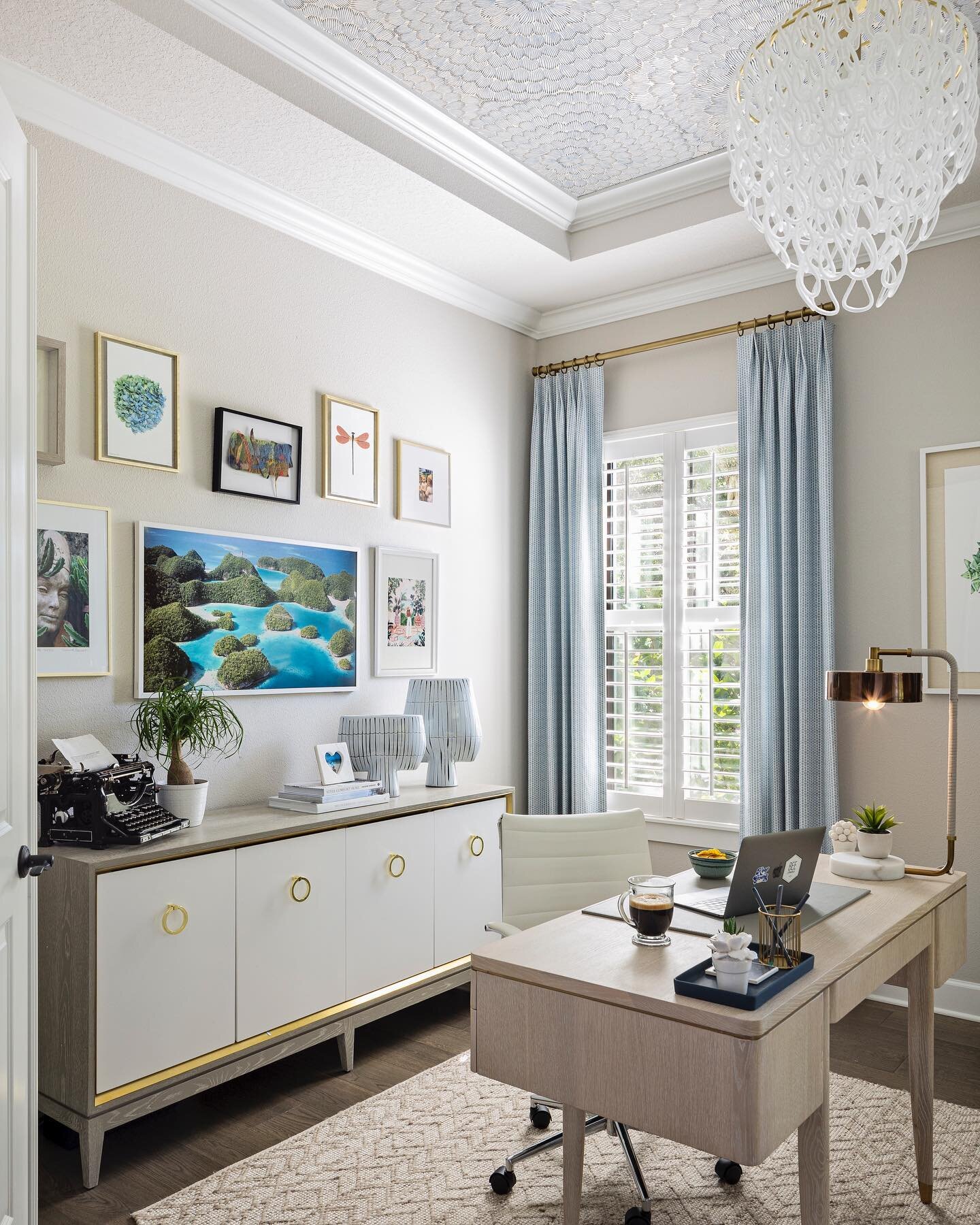 ✨HER OFFICE✨A home office can be so much more than just a work space.  It can be a calming retreat and mom-den, too! We created an artfully curated gallery wall with Samsung frame TV, a beautiful credenza for storage, an elegant Executive desk, and a