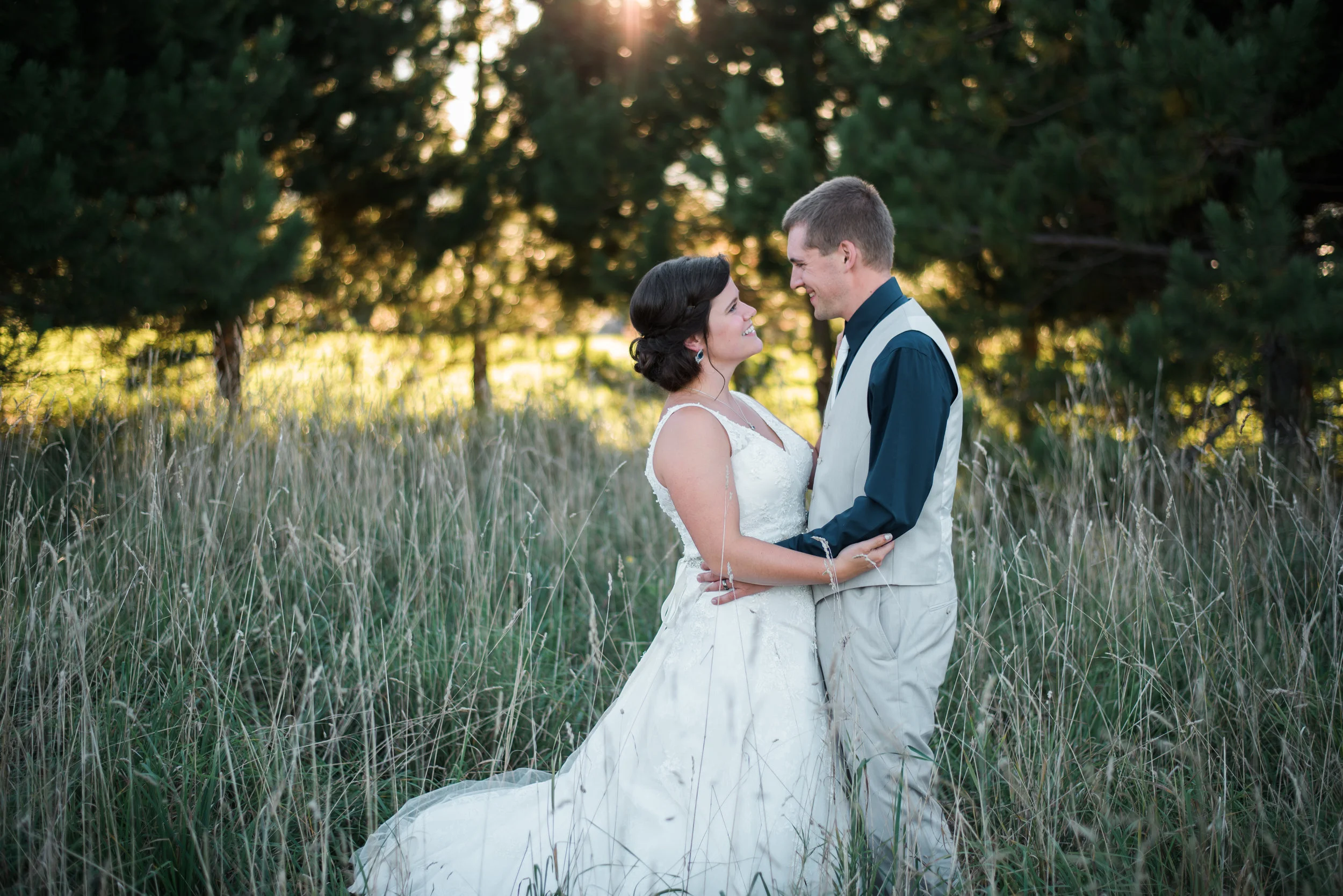 Angela + Bill "If I could give Shawna more stars, I would! The most important thing, other than actually getting married, was choosing an amazing photographer and I am so glad we found Shawna! To have the special memories she captured to pass along to our family and future generations, it means so much to me! From first meeting with her, to our engagement shoot, and then the big day, by the time Shawna left, it was like she was part of our family. She is such a kind hearted, down to earth, all around fantastic person! I received so many compliments from my bridal party and family about how amazing she was. The talent that she has is hands down phenomenal! If you are looking for a photographer, I would highly recommend Shawna Vine!"