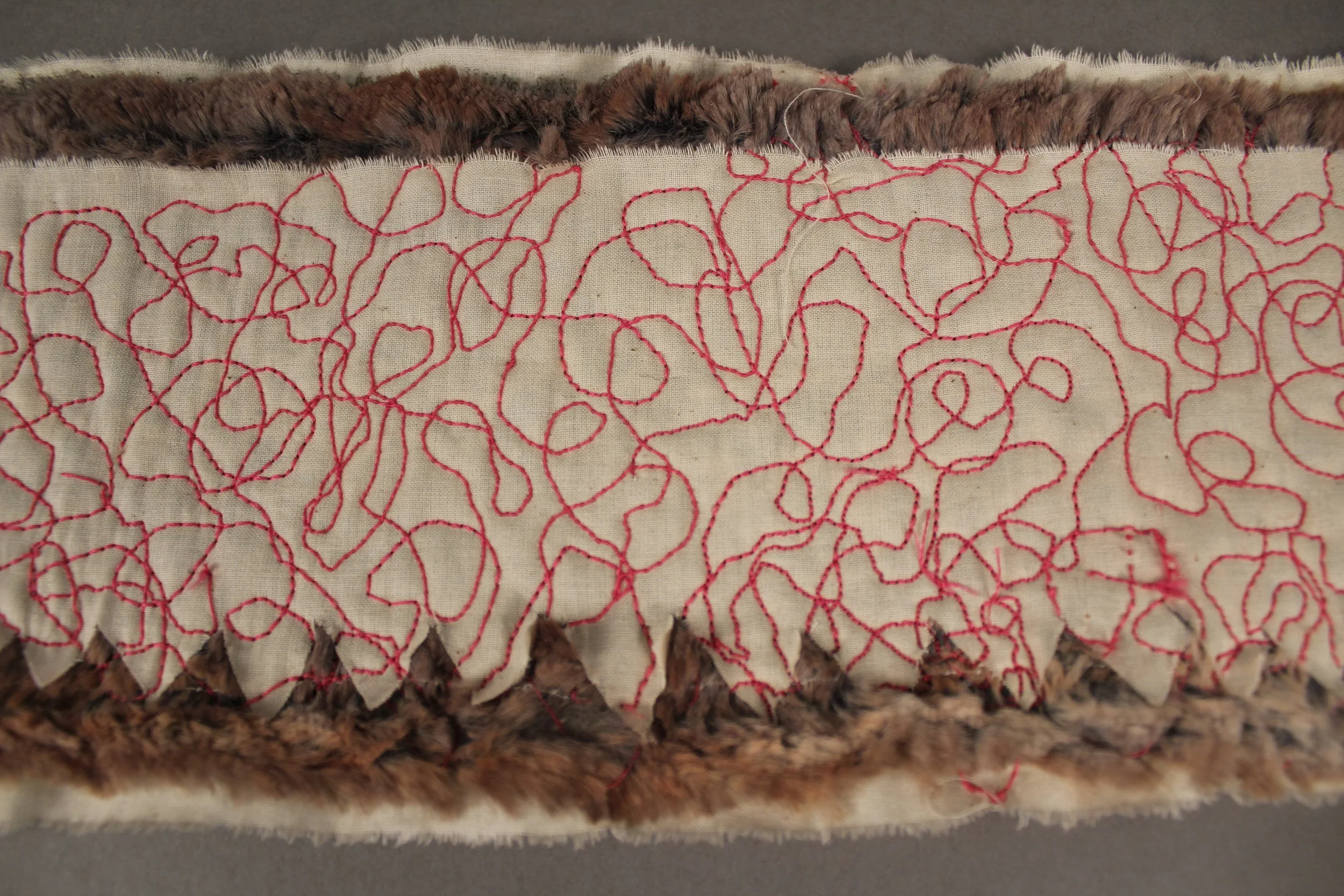   Feral   5 x 1 x 40 (Arrangement Variable)  Muslin, Thread, Faux Fur, Plastic, Acrylic  2024 