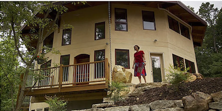  FOUNDER'S RESIDENCE This residence, completed in 2013, is a complex yet integral living design well-suited for a family of 6. Built from clay wetted and compressed straw. this unique design is a fusion of spatial science, ecology, sacred geometry, and health and was featured in Green Builder Magazine in 2014. Learn More →