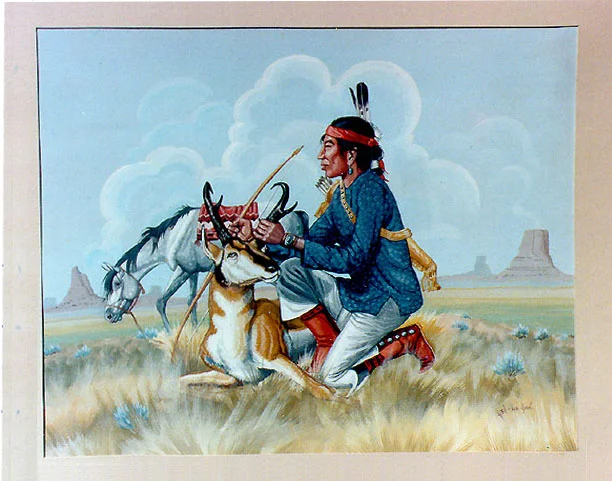  A Navajo hunter inspects the kill he has made- a large pronghorn. The background landscape is easily that of red valley or a nearby region in Arizona as evidenced by the small mesas and scrubby grasses of that region.  