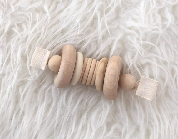 CloverandBirch_grasping_rattle.jpg